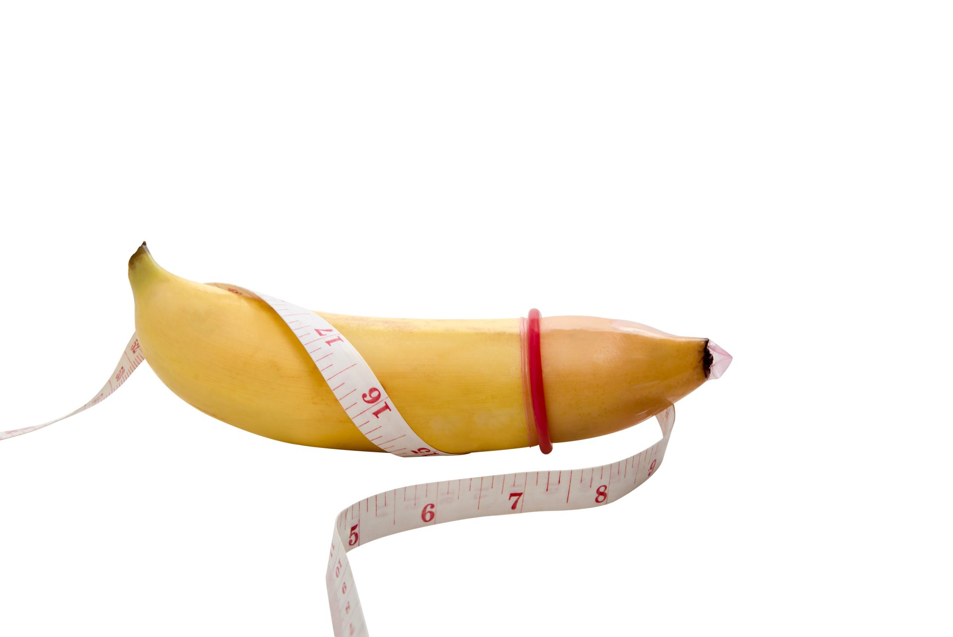 Óvszerméretek bemutatása egy banánon mérőszallaggal